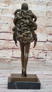 Bronze Sculpture of Woman Wearing Snakes - Unwavering by Pascal Delor
