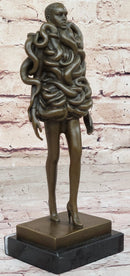 Bronze Sculpture of Woman Wearing Snakes - Unwavering by Pascal Delor