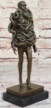 Bronze Sculpture of Woman Wearing Snakes - Unwavering by Pascal Delor