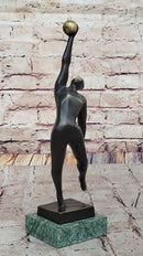 Abstract Bronze Volleyball Athlete with Ball on Marble Base