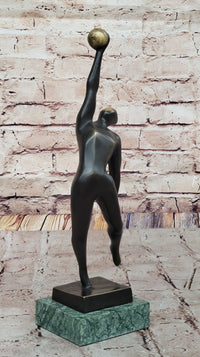 Abstract Bronze Volleyball Athlete with Ball on Marble Base