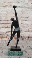 Abstract Bronze Volleyball Athlete with Ball on Marble Base