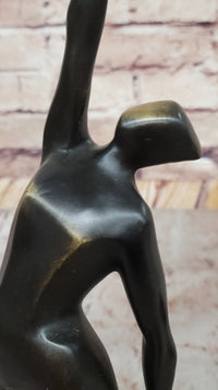 Abstract Bronze Volleyball Athlete with Ball on Marble Base