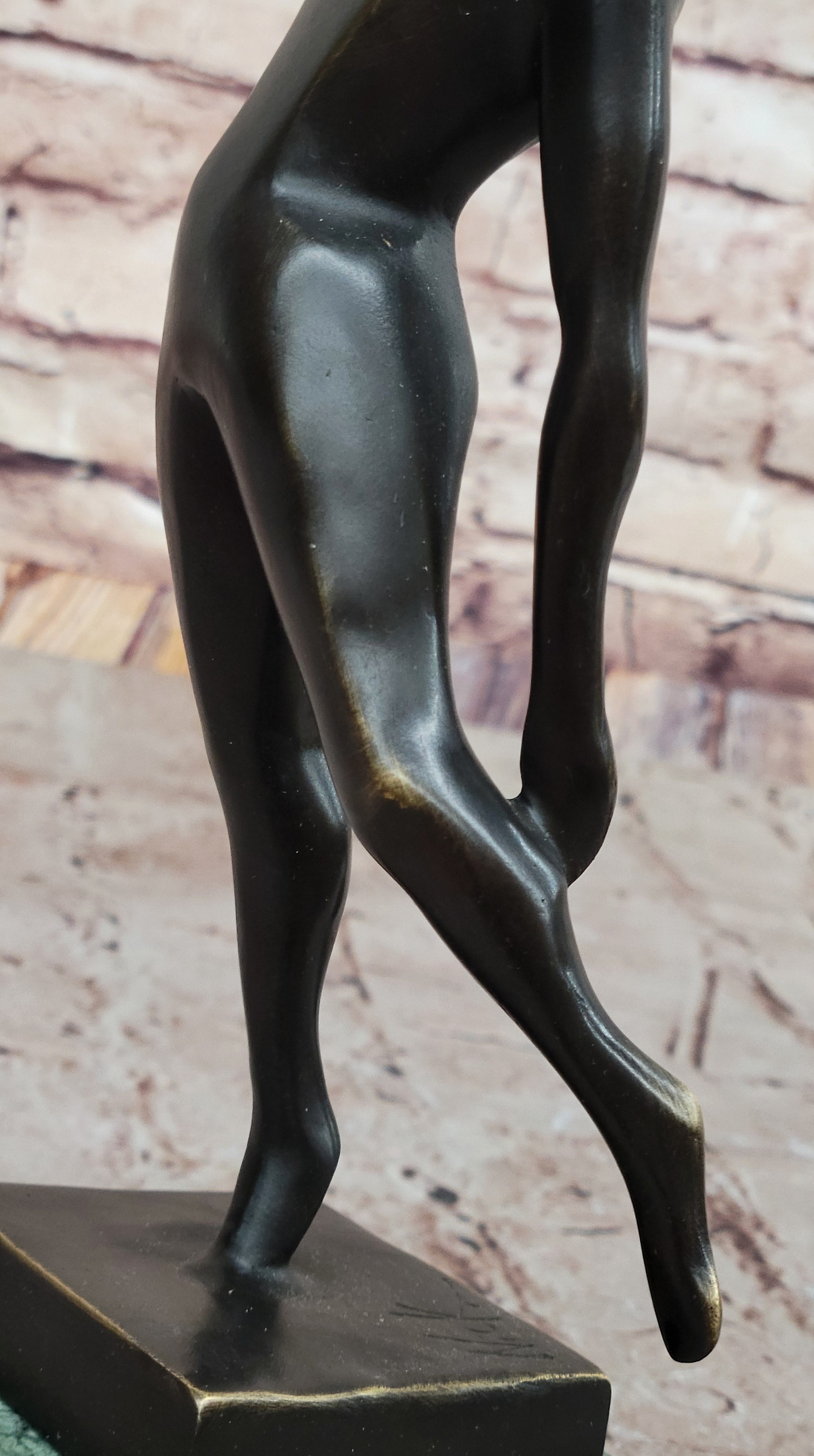 Abstract Bronze Volleyball Athlete with Ball on Marble Base