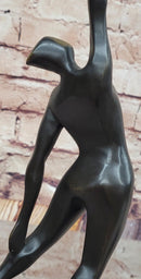 Abstract Bronze Volleyball Athlete with Ball on Marble Base