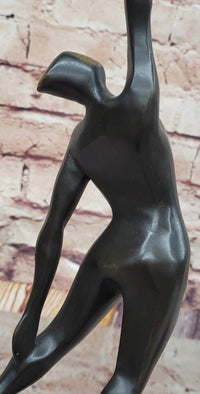 Abstract Bronze Volleyball Athlete with Ball on Marble Base