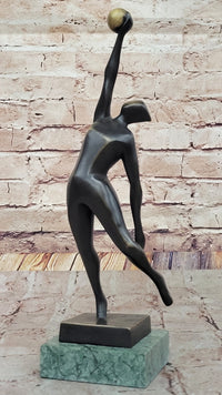Abstract Bronze Volleyball Athlete with Ball on Marble Base