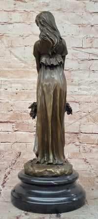 Bronze Sculpture of a Young Woman Holding a Basket of Flowers, Signed Milo Statue