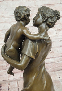 Bronze Sculpture a Tender Scene of a Mother Holding Her Child Signed Moreau