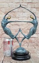 Love in Balance Modern Bronze Dancing Couple Sculpture with Green Patina