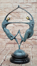 Love in Balance Modern Bronze Dancing Couple Sculpture with Green Patina