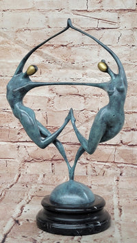 Love in Balance Modern Bronze Dancing Couple Sculpture with Green Patina