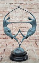 Love in Balance Modern Bronze Dancing Couple Sculpture with Green Patina