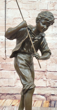 Bronze Sculpture of Boy Fishing by Rancoulet