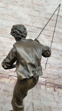Bronze Sculpture of Boy Fishing by Rancoulet