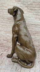 Lifelike Bronze Dog – Realistic Sitting Dog Sculpture