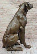 Lifelike Bronze Dog – Realistic Sitting Dog Sculpture