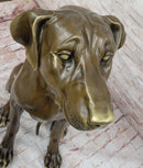 Lifelike Bronze Dog – Realistic Sitting Dog Sculpture