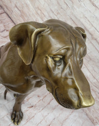 Lifelike Bronze Dog – Realistic Sitting Dog Sculpture