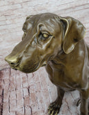Lifelike Bronze Dog – Realistic Sitting Dog Sculpture