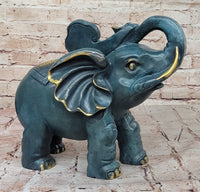 Bronze Elephant Sculpture with Trunk Up and Gold Accents