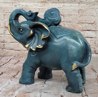 Bronze Elephant Sculpture with Trunk Up and Gold Accents