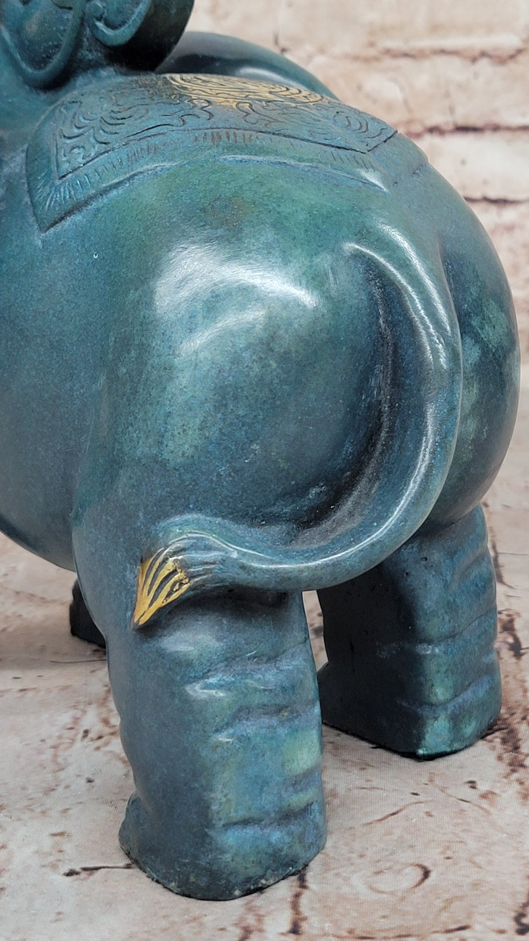 Bronze Elephant Sculpture with Trunk Up and Gold Accents