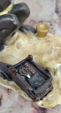 A Franz Bergman cold painted bronze figural group of an Arab barber at work