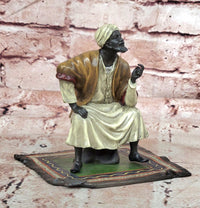 FRANZ BERGMAN GENUINE BRONZE SCULPTURE OF AN ORIENTAL MERCHANT ON CARPET COLLECTIBLE ART