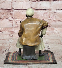 FRANZ BERGMAN GENUINE BRONZE SCULPTURE OF AN ORIENTAL MERCHANT ON CARPET COLLECTIBLE ART