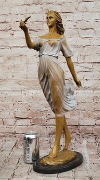 Bronze Woman with Bird - Flowing Dress