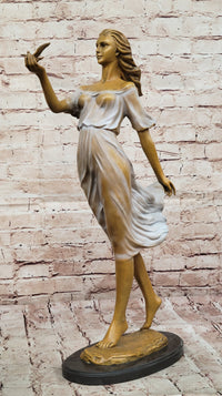 Bronze Woman with Bird - Flowing Dress