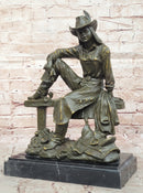 Bronze Cowgirl Sculpture – Western Lady on Fence Statue