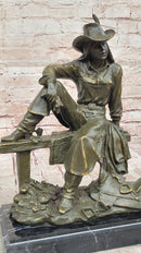 Bronze Cowgirl Sculpture – Western Lady on Fence Statue