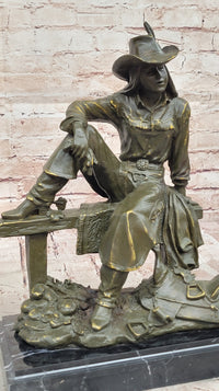 Bronze Cowgirl Sculpture – Western Lady on Fence Statue