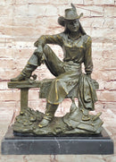 Bronze Cowgirl Sculpture – Western Lady on Fence Statue