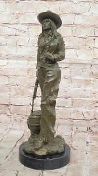 Western Bronze Cowgirl Sculpture with Rifle and Cowboy Hat