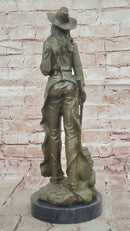 Western Bronze Cowgirl Sculpture with Rifle and Cowboy Hat