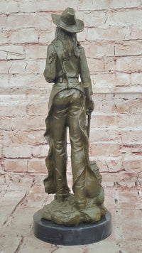 Western Bronze Cowgirl Sculpture with Rifle and Cowboy Hat