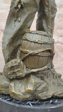 Western Bronze Cowgirl Sculpture with Rifle and Cowboy Hat