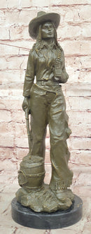 Western Bronze Cowgirl Sculpture with Rifle and Cowboy Hat