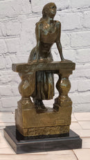 Bronze Sculpture Depicts a Woman Leaning Against a Balustrade Signed Milo Statue
