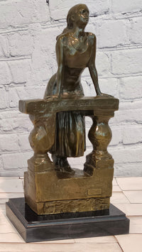 Bronze Sculpture Depicts a Woman Leaning Against a Balustrade Signed Milo Statue