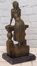 Bronze Sculpture Depicts a Woman Leaning Against a Balustrade Signed Milo Statue