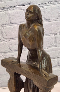 Bronze Sculpture Depicts a Woman Leaning Against a Balustrade Signed Milo Statue