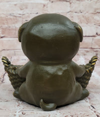 Bronze Pug in Basket - Whimsical Dog Sculpture