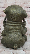 Bronze Pug Puppy Holding Woven Basket – Dog Figurine