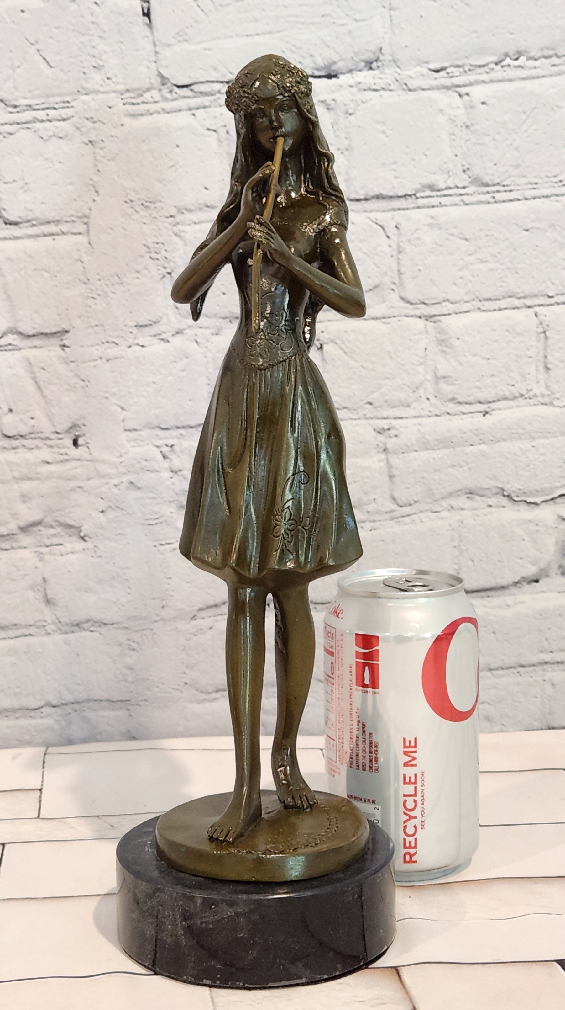 Hand Made Bronze Sculpture of a Young Girl playing the Flute by J. Patoue