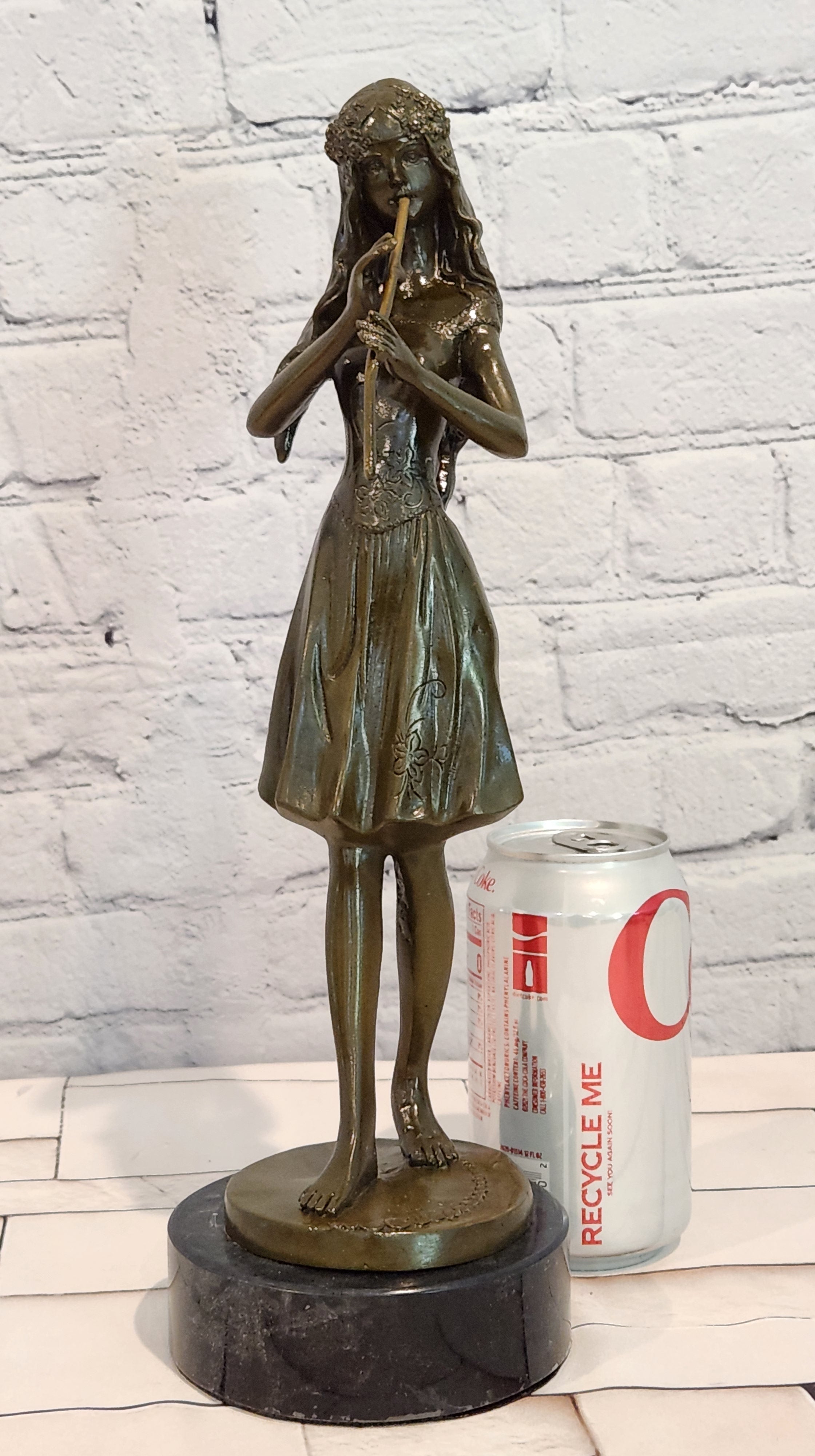Hand Made Bronze Sculpture of a Young Girl playing the Flute by J. Patoue