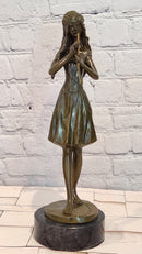 Hand Made Bronze Sculpture of a Young Girl playing the Flute by J. Patoue